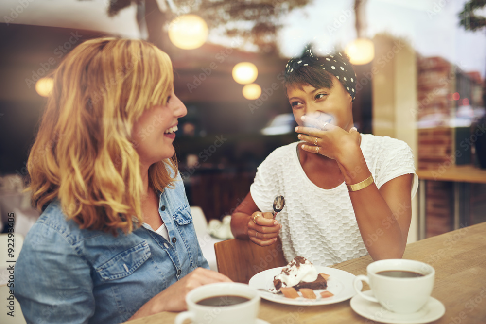 Two good friends enjoying a cup of coffee Two good friends enjoying a cup of coffee