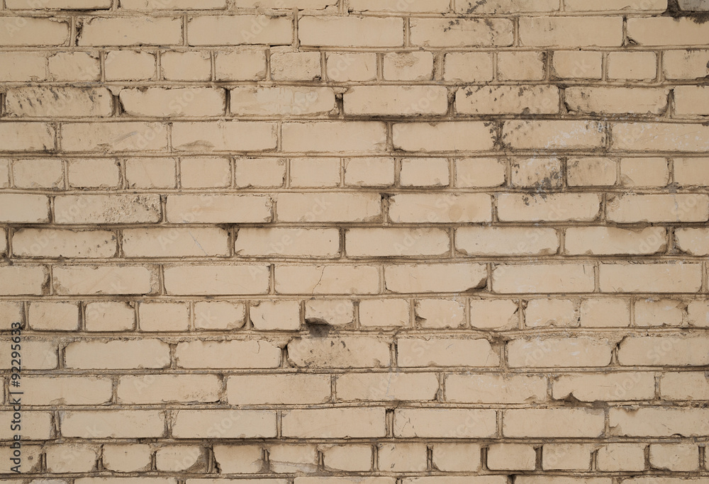 Obraz premium Texture of old yellow brick wall