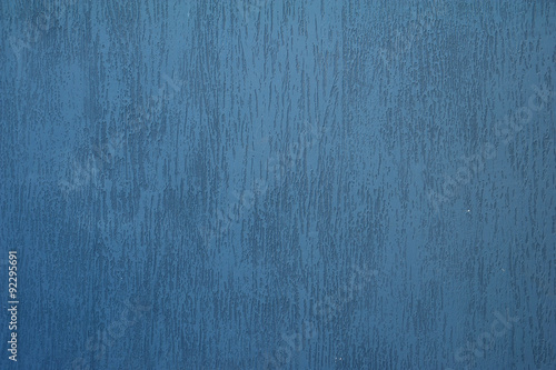 Texture of old wall covered with blue stucco