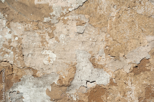 Texture of old wall covered with brown stucco