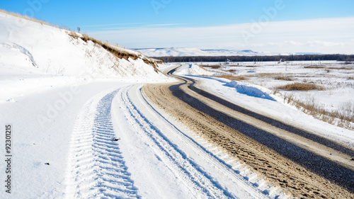 Winter snow-covered winding road