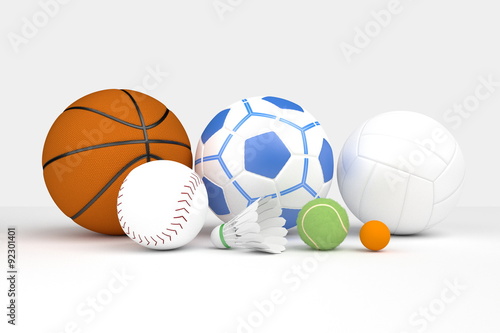 Many balls used in many kinds of sport in the light grey background.