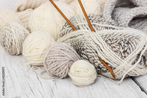 Skeins of wool yarn and knitting needles Fototapeta