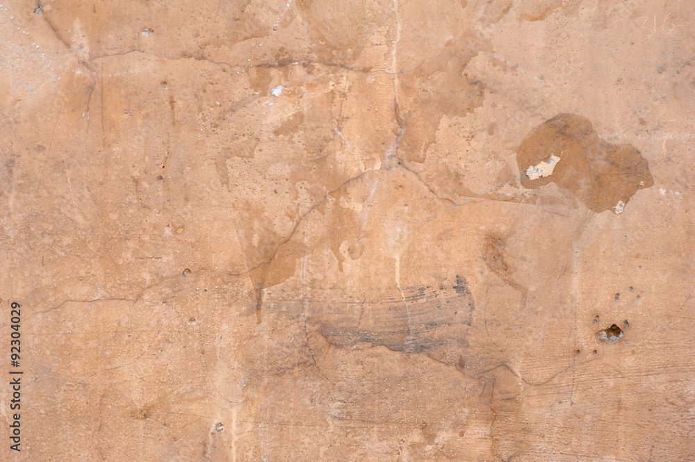 Texture of old wall covered with brown stucco Texture of old wall covered with brown stucco
