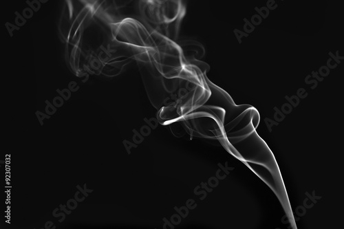 White smoke on black background