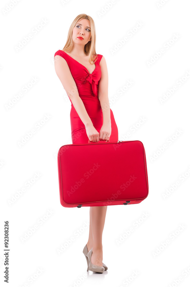 Blondie in red dress with suitcase isolated on white Blondie in red dress with suitcase isolated on white