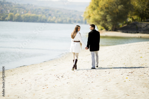 Young couple by the river