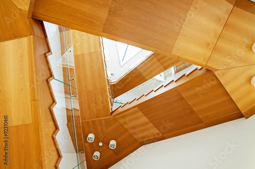 Modern interior with wooden stairs