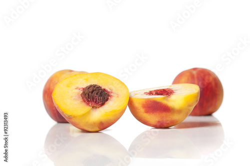 Juicy peaches on white background