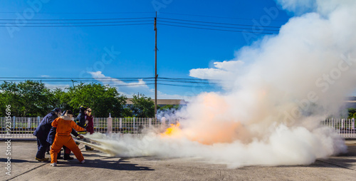 Firefighter fighting fire during training