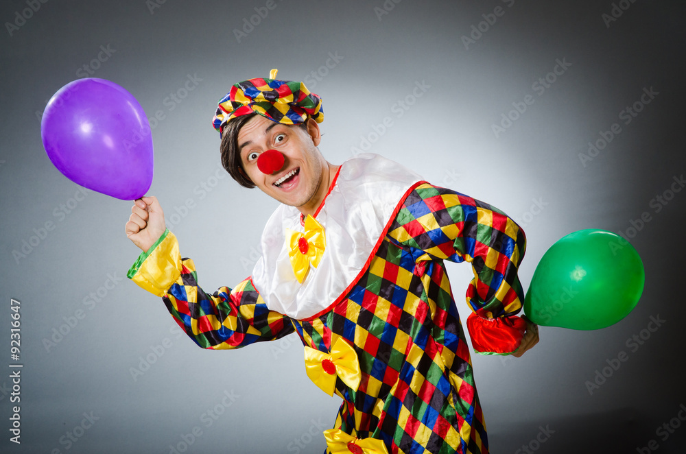 Funny clown in comical concept Funny clown in comical concept