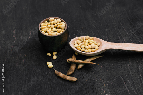 Soybeans pod, harvest of soy beans background Soybeans on a wooden background. rustic style photo