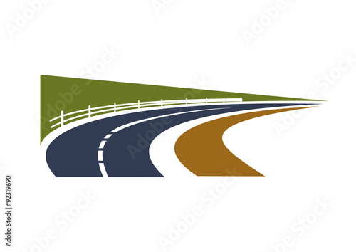 Country road turn among green fields