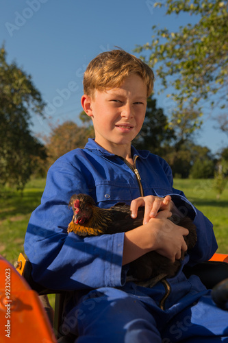 Farm Boy with tractor photo