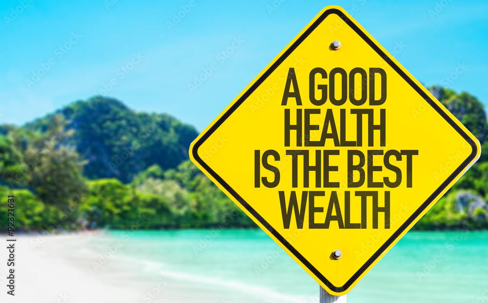 A Good Wealth Is The Best Wealth sign with beach background