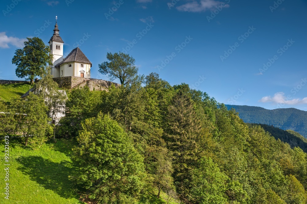 Church in the Mountain Village on a Sunny Summer day