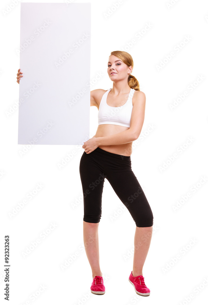 Fitness sporty woman holding blank empty ad banner Fitness sporty woman holding blank empty ad banner