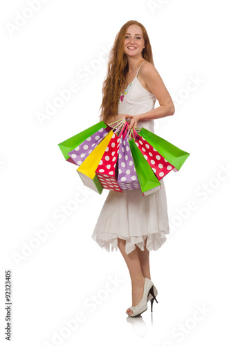 Woman with shopping bags isolated on white