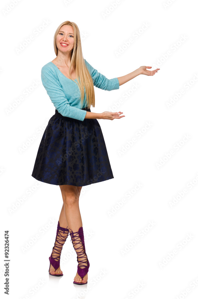 Fototapeta premium Blond hair girl in dark blue skirt isolated on white