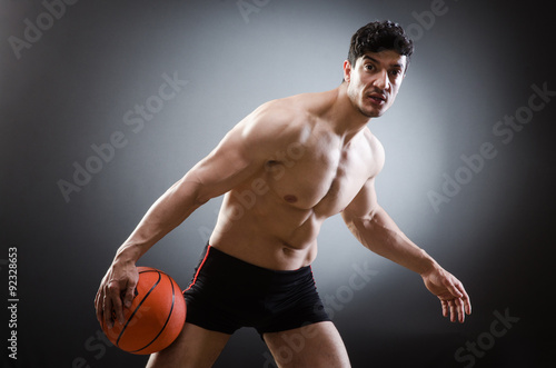 Muscular basketball in sports concept