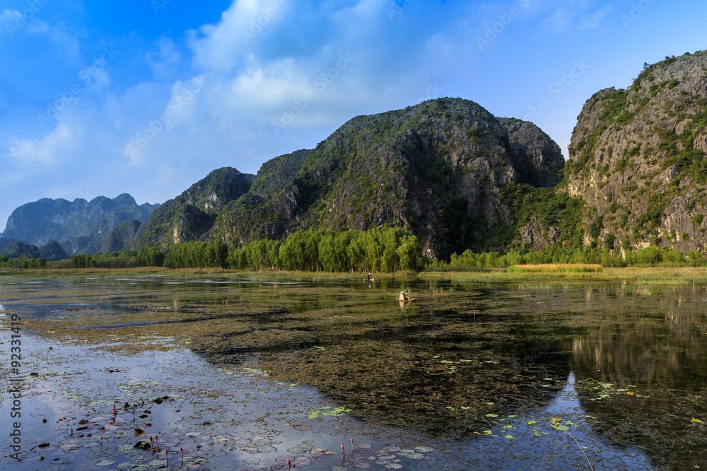 Landscape in Van Long natural reserve in Ninh Binh, Vietnam. Vietnam landscapes. Landscape in Van Long natural reserve in Ninh Binh, Vietnam. Vietnam landscapes.