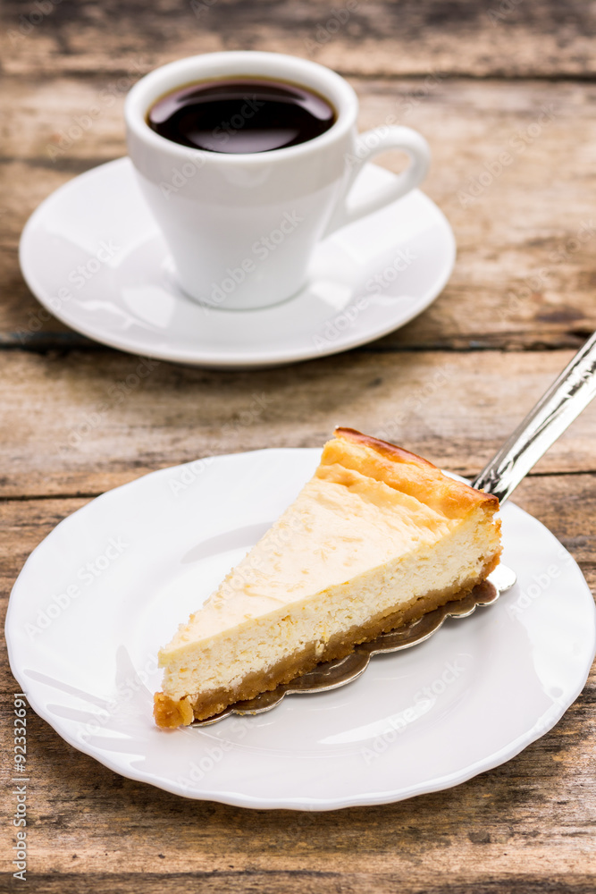 cup of coffee with slice of cheesecake cup of coffee with slice of cheesecake