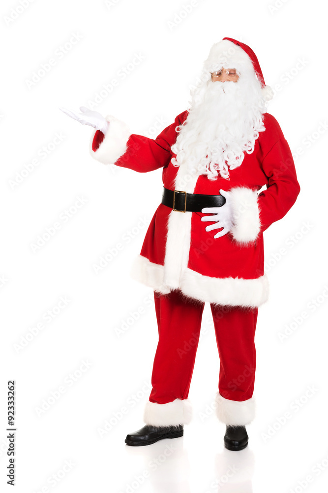Full length Santa Claus with a welcome gesture Full length Santa Claus with a welcome gesture