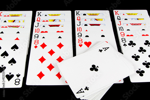 Playing Cards Game on Black Background photo