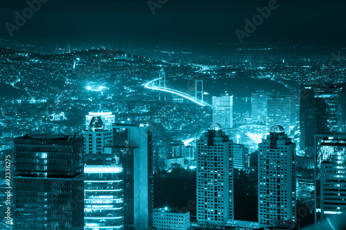 Photography Night view of the illuminated city downtown, skyscrapers and