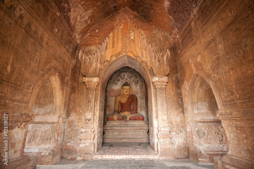 BAGAN  MYANMAR - MAY 4  Buddha statue inside ancient pagoda on MAY 4 2013 in Bagan  Myanmar. Bagan s prosperous economy built over 10000 temples between the 11th and 13th centuries.