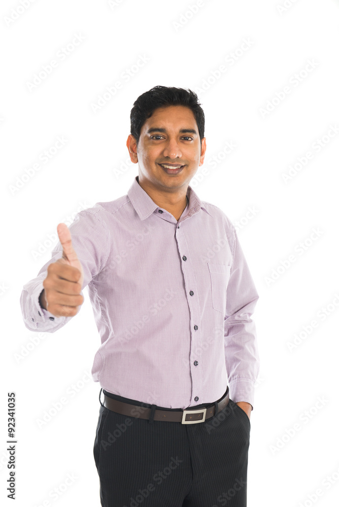 indian business male with thumbs up and smiling indian business male with thumbs up and smiling