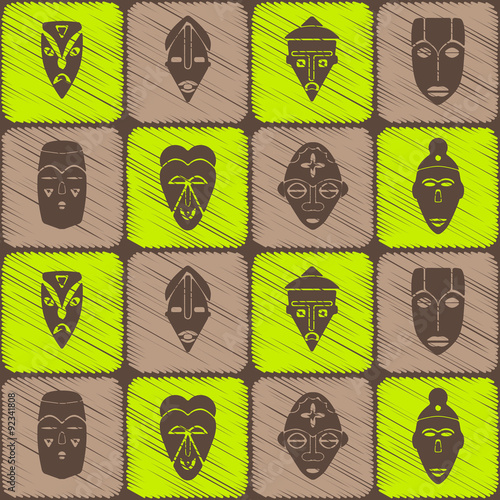Seamless background with African ritual masks for your design