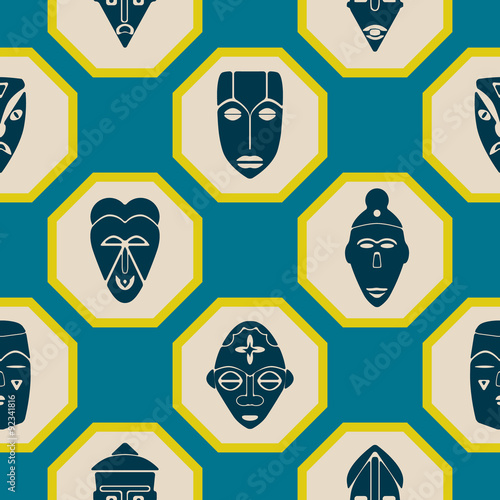 Seamless background with African ritual masks for your design