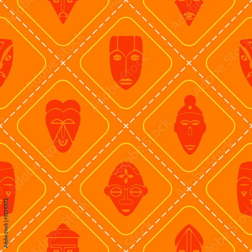 Seamless background with African ritual masks for your design