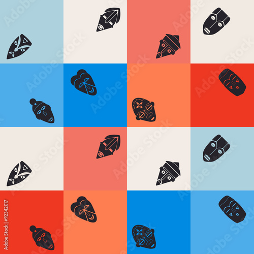 Seamless background with African ritual masks for your design