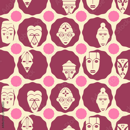 Seamless background with African ritual masks for your design