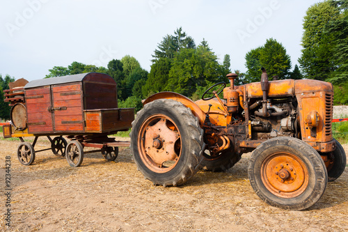 Old tractor with farm wagon, agriculture, rural life