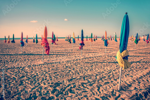 Colorful parasols on Deauville beach, France, vintage process