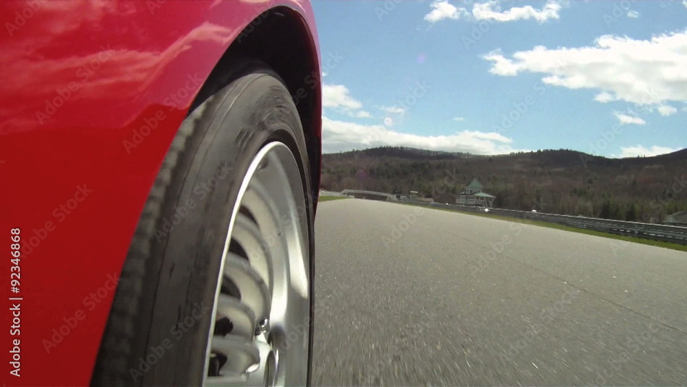 POV racing shot from front right wheel POV racing shot from front right wheel