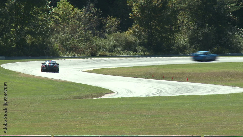 Race cars making an S curve Race cars making an S curve