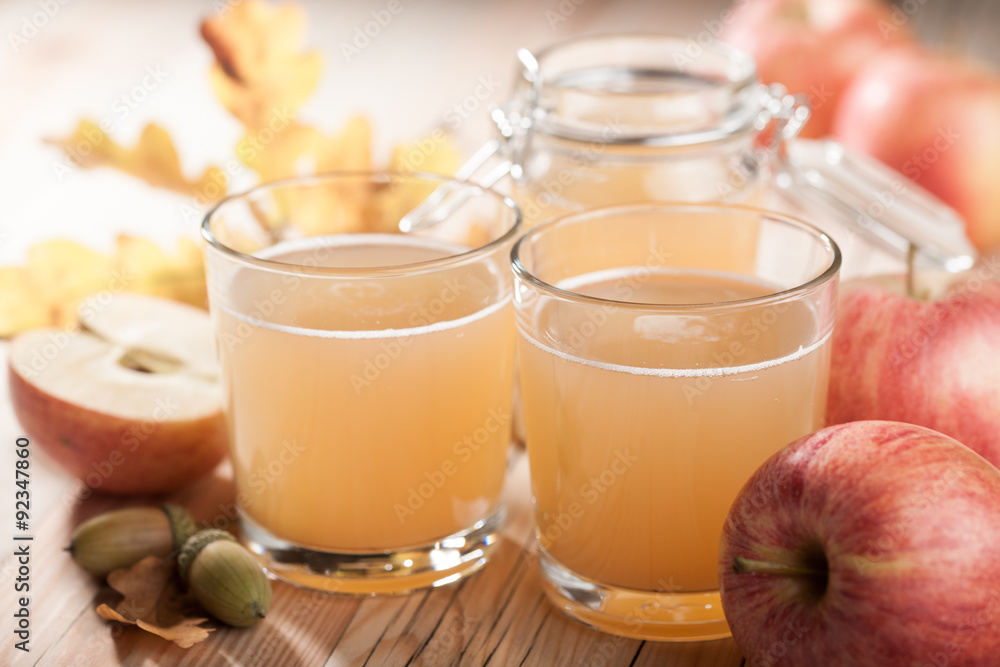 Fresh apple juice and apples Fresh apple juice and apples