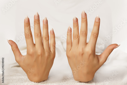 beautiful female hands with well-manicured nails