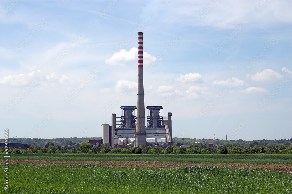 thermal power plant on green wheat field industry