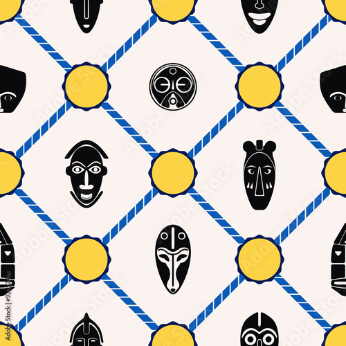 Seamless background with African ritual masks for your design