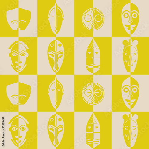 Seamless background with African ritual masks for your design