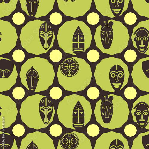 Seamless background with African ritual masks for your design