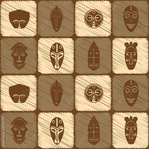 Seamless background with African ritual masks for your design