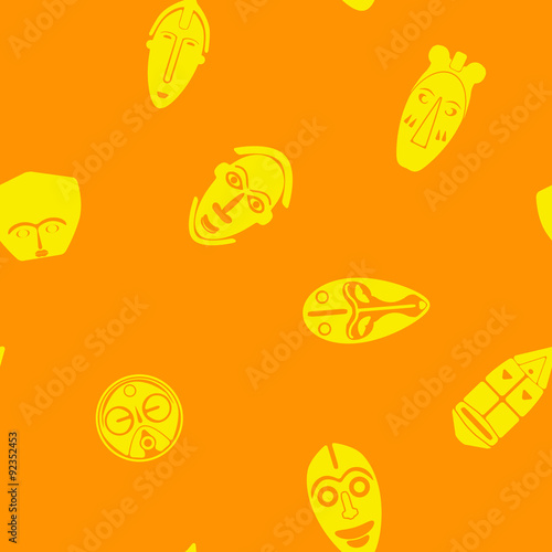 Seamless background with African ritual masks for your design