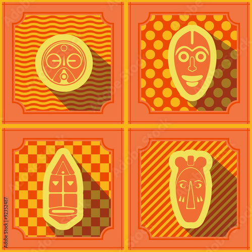 Seamless background with African ritual masks for your design