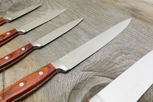 knives on a wooden surface